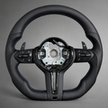BMW F Series flat bottom steering wheel in black leather with M Sport tri-colour stitching, front view